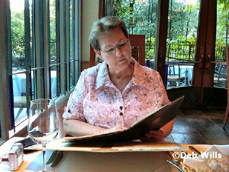 Linda looks over menu