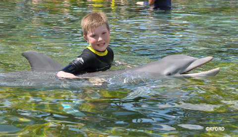 discovery-cove-carter-and-dolphin.jpg
