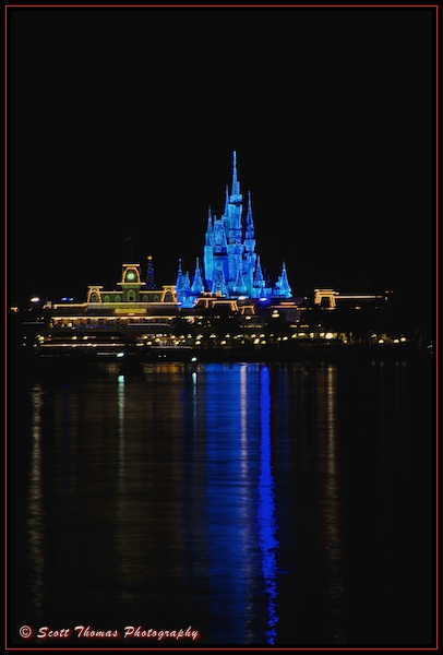 Cinderella Castle in holiday Dream Lights from the Ticket and Transportation Center, Walt Disney World, Orlando, Florida.