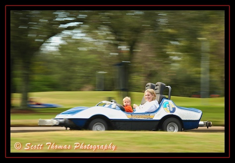 Racing along Tomorrowland Indy Speedway in the Magic Kingdom, Walt Disney World, Orlando, Florida