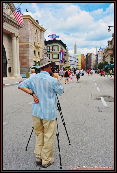 A photographer sets up for a photo along one of the Streets of America in Disney's Hollywood Studios, Walt Disney World, Orlando, Florida.