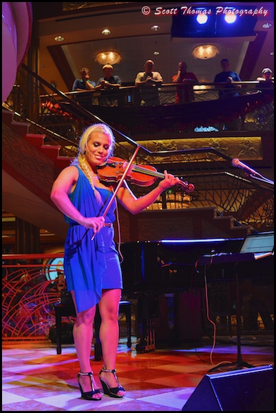 Greta SaloÌme performing in the Atrium of the Disney Dream cruise ship