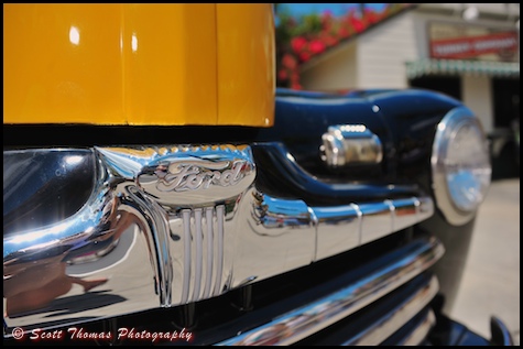The chrome grill of a yellow texi parked on Sunset Blvd. in Disney's Hollywood Studios, Walt Disney World, Orlando, Florida