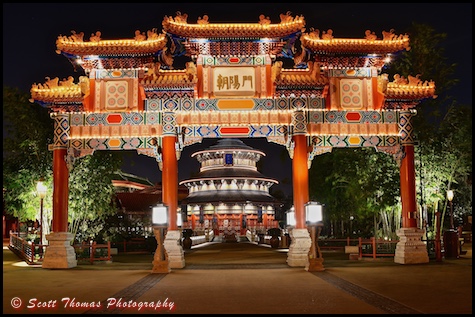 Paifang Gate in front of the Hall of Prayer for Good Harvest at night in the China pavilion in Epcot's World Showcase, Walt Disney World, Orlando, Florida