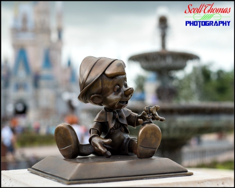 Pinocchio and Jiminy Cricket statuette in the Central Plaza at Magic Kingdom, Walt Disney World, Orlando, Florida