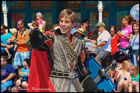 Prince Phillip walks confidently before the Sleeping Beauty float in the Festival of Fantasy parade in the Magic Kingdom, Walt Disney World, Orlando, Florida