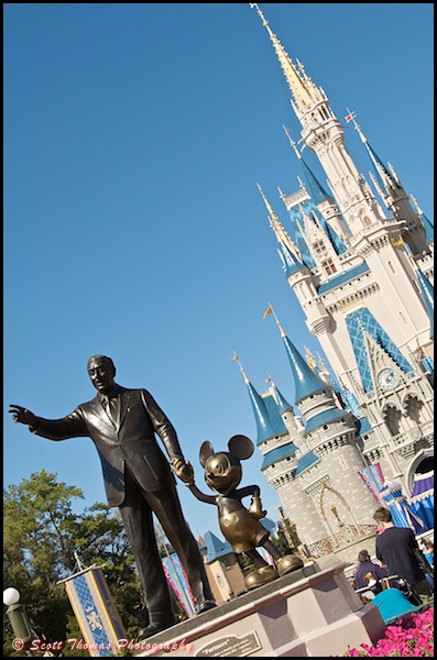 A creative view of the Partners Statue in front of Cinderella Castle at the Magic Kingdom, Walt Disney World, Orlando, Florida