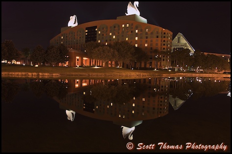 The Swan Resort mirrored in the canal the Friendship boats use during the day, Walt Disney World, Orlando, Florida.