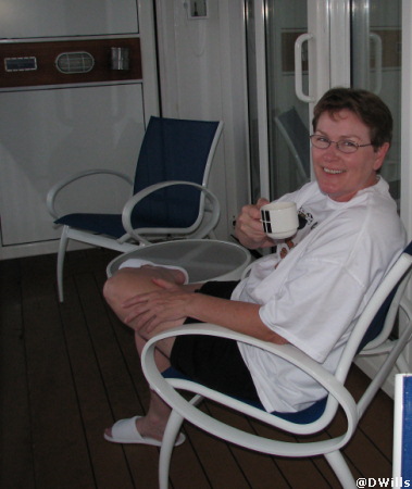  Linda enjoys the view from our balcony