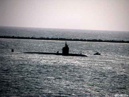 Submarine Surfaces just outside the Canal
