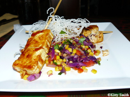 Marinated tofu over a corn salsa
