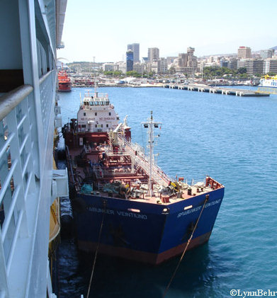 Fuel Barge alongside the Disney Magic