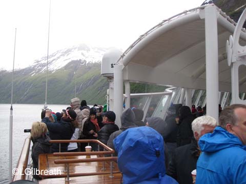 On deck entering Geiranger fjord
