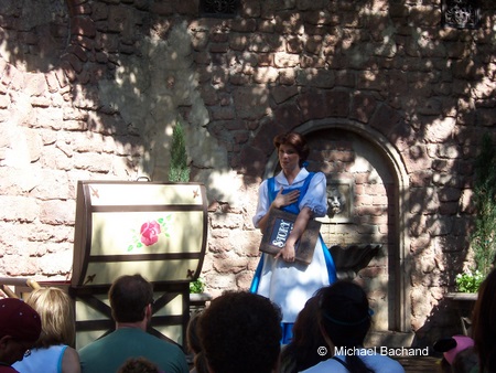 Belle telling the story of Beauty and the Beast