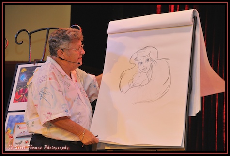 Don Ducky Williams finishing up a character portrait in the Odyssey restaurant in Epcot, Walt Disney World, Orlando, Florida