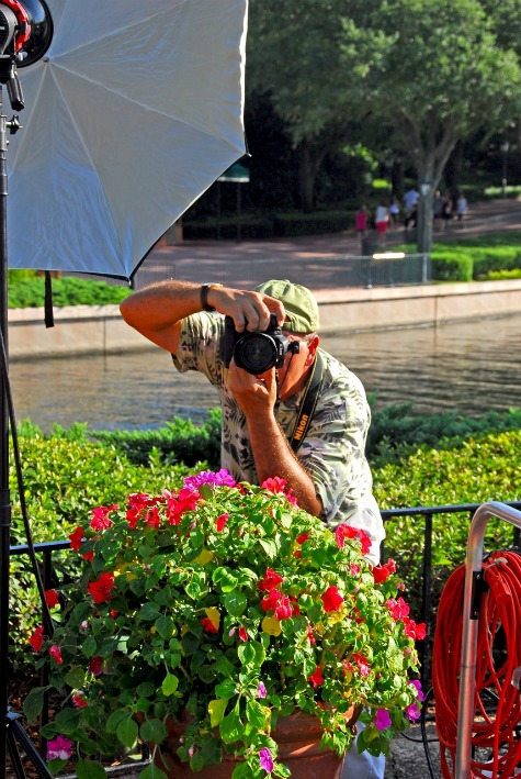 Disney photographer, Bob Desmond, working in Epcot's World Showcase, Walt Disney World, Orlando, Florida Disney photographer, Bob Desmond, working in Epcot's World Showcase, Walt Disney World, Orlando, Florida