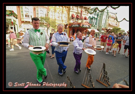 The Dapper Dans barbershop quartet entertain guests along Main Street USA in the Magic Kingdom, Walt Disney World, Orlando, Florida