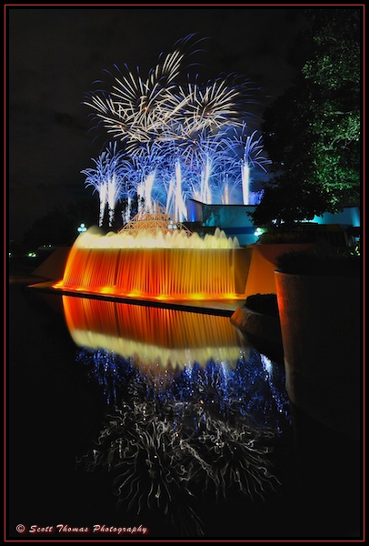 Illuminations firework bursts behind the Imagination pavilion in Epcot, Walt Disney World, Orlando, Florida