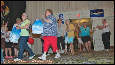 Guests enter MagicMeets on Saturday, August 8, 2009, in Harrisburg, Pennsylvania while Fred Block looks on.