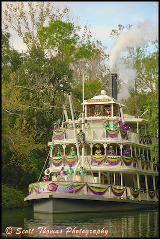 Tiana's Showboat Jubilee comes around the bend in the Magic Kingdom, Walt Disney World, Orlando, Florida.