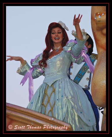 Princess Ariel waving to guests during the Make A Dream Come True parade in the Magic Kingdom, Walt Disney World, Orlando, Florida