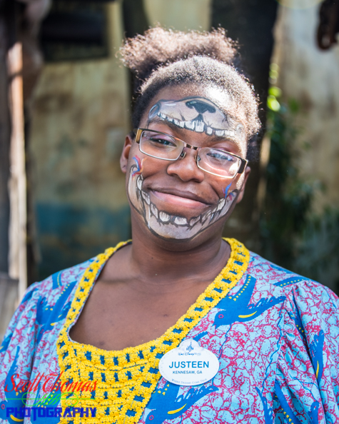 Cast Member Face Painter in the African village of Harambe at Disney's Animal Kingdom, Walt Disney World, Orlando, Florida Cast Member Face Painter in the African village of Harambe at Disney's Animal Kingdom, Walt Disney World, Orlando, Florida