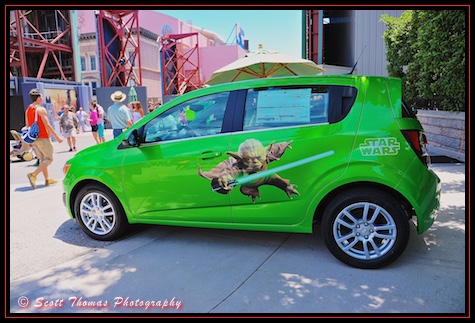 Green Chevrolet Spark with Yoda and Star Wars graphics on display at Disney's Hollywood Studios during Star Wars Weekend, Walt Disney World, Orlando, Florida