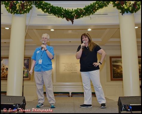 Deb Wills and Beci Mahnken welcome guests to the rotunda of the American Adventure and the start of the Anniversary Adventure on Saturday, December 5, 2015, Walt Disney World, Orlando, Florida