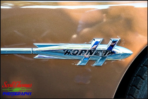 Quarter panel emblem of a 1951 Hudson Hornet photographed near Syracuse, New York