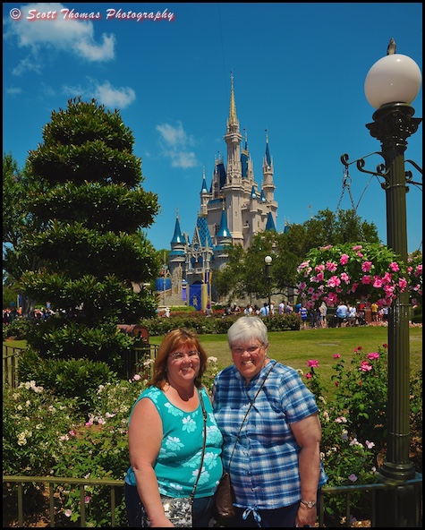 People in front of Cinderella Castle at the Magic Kingdom, Walt Disney World, Orlando, Florida People in front of Cinderella Castle at the Magic Kingdom, Walt Disney World, Orlando, Florida