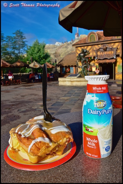 Warm cinnamon roll and cold milk from Gaston's Tavern in Fantasyland at the Magic Kingdom, Walt Disney World, Orlando, Florida
