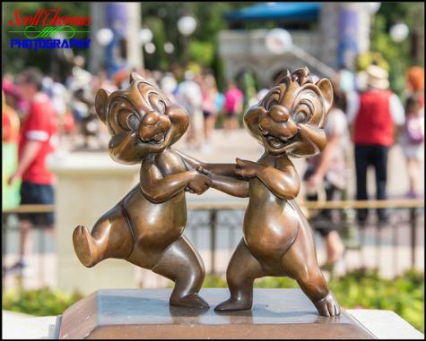 Chip and Dale Chipmunk statuette on the Main Street Plaza Gardens in the Magic Kingdom, Walt Disney World, Orlando, Florida Chip and Dale Chipmunk statuette on the Main Street Plaza Gardens in the Magic Kingdom, Walt Disney World, Orlando, Florida