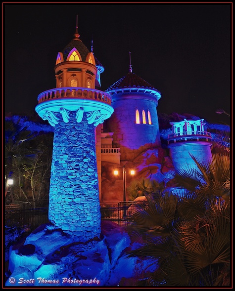 Prince Eric's seaside castle shines at night in Fantasyland at the Magic Kingdom, Walt Disney World, Orlando, Florida