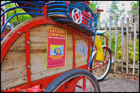 A tricycle parked near Kali River Rapids entrance in Disney's Animal Kingdom, Walt Disney World, Orlando, Florida A tricycle parked near Kali River Rapids entrance in Disney's Animal Kingdom, Walt Disney World, Orlando, Florida