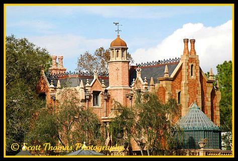 The Haunted Mansion in bright sun in the Magic Kingdom, Walt Disney World, Orlando, Florida. The Haunted Mansion in bright sun in the Magic Kingdom, Walt Disney World, Orlando, Florida.