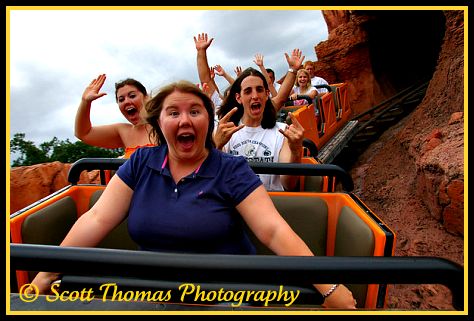 Riding Big Thunder Mountain Rail Road in the Magic Kingdom, Walt Disney World, Orlando, Florida.