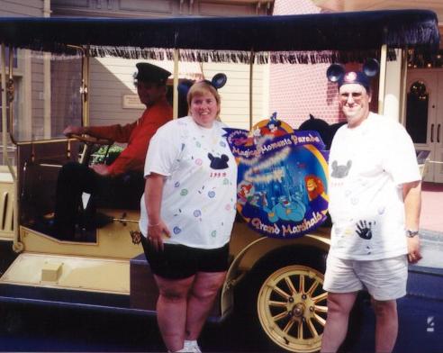 Karen and Paul in Front of Grand Marshall Car