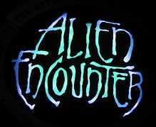 Alien Encounter Sign at Night