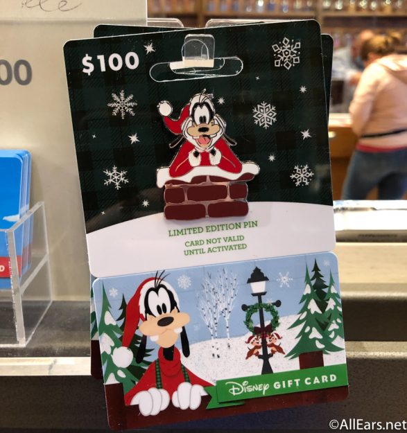 https://allears.net/wp-content/uploads/2020/11/WDW-2020-Magic-Kingdom-World-of-Disney-Christmas-Gift-Card-and-Pin-6-587x625.jpg