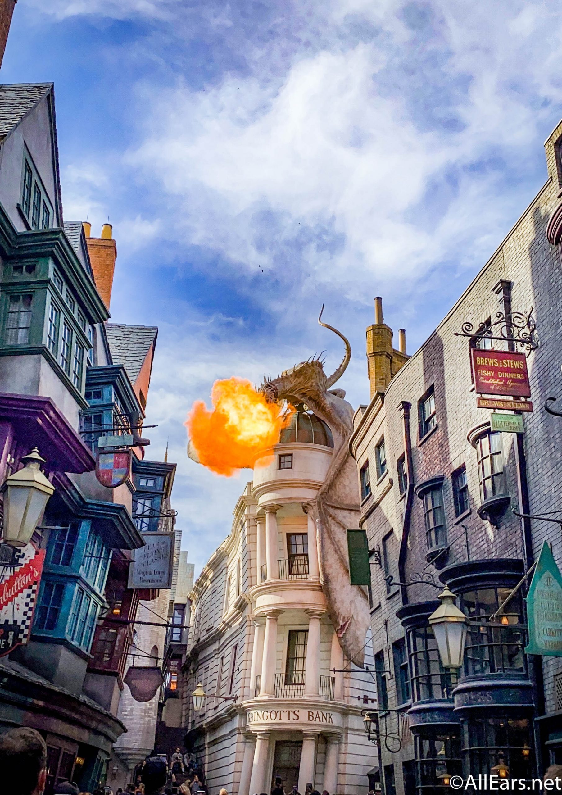 Download Magical Diagon Alley street bustling with life Wallpaper   Wallpaperscom