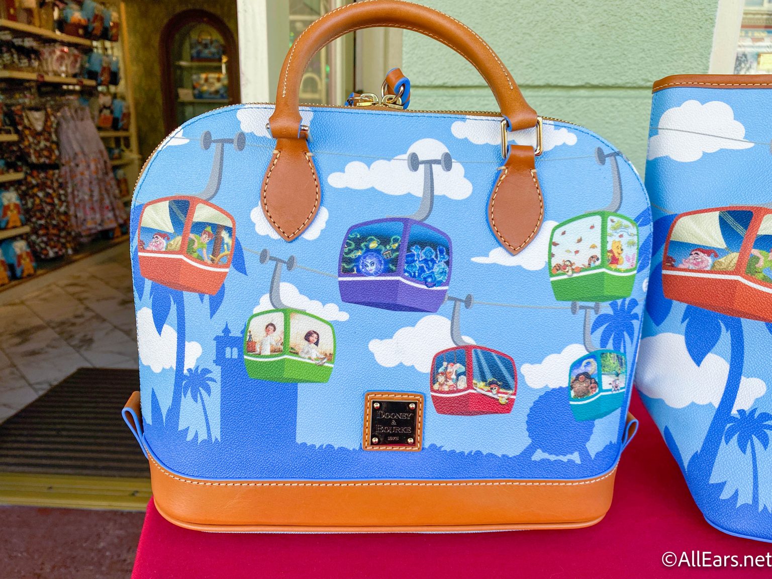 PHOTOS NEW Dooney & Bourke Skyliner Collection is Available in Disney