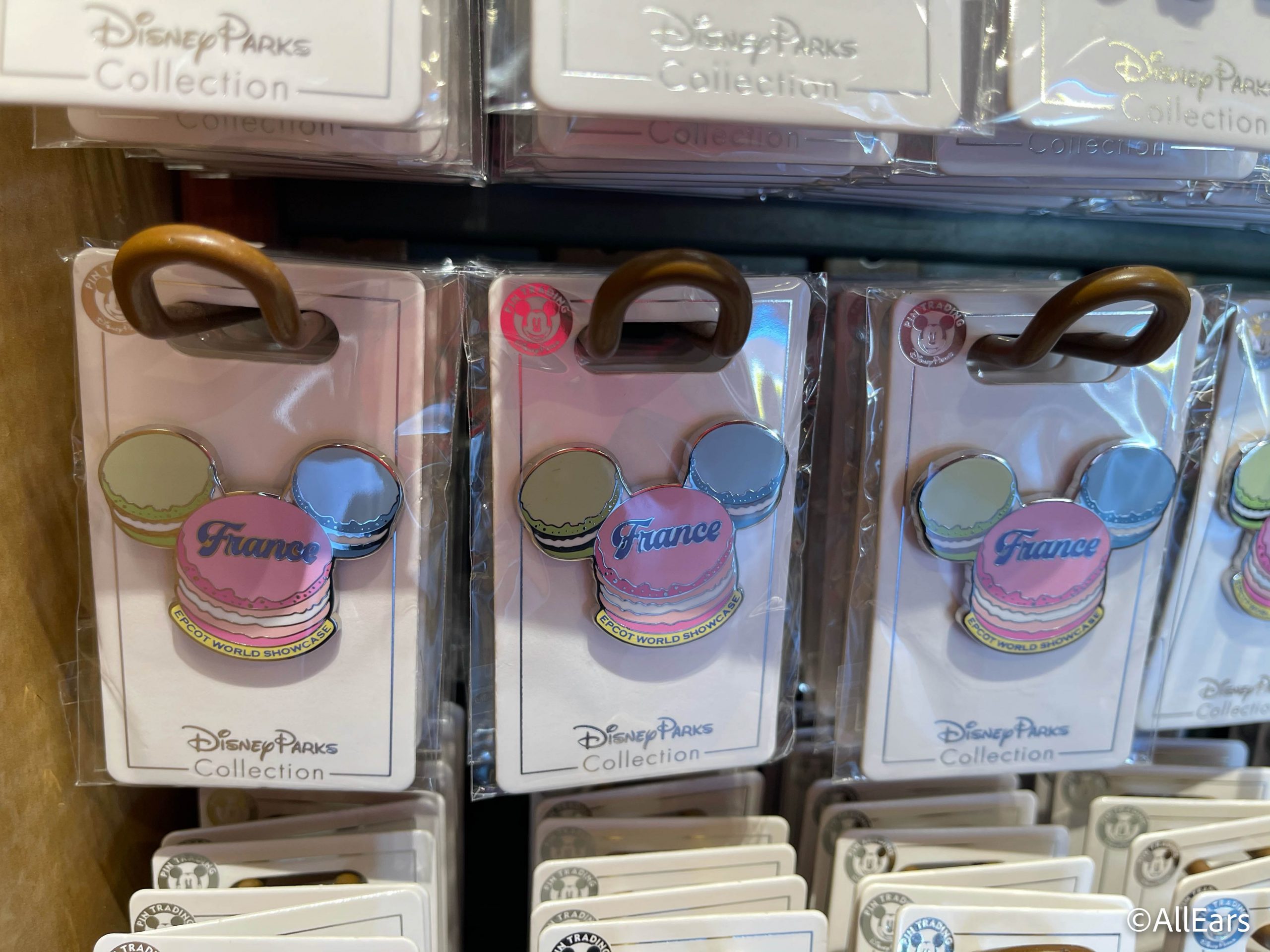 https://allears.net/wp-content/uploads/2021/03/2021-wdw-disney-springs-pin-traders-world-showcase-pins-france-macaron-scaled.jpg
