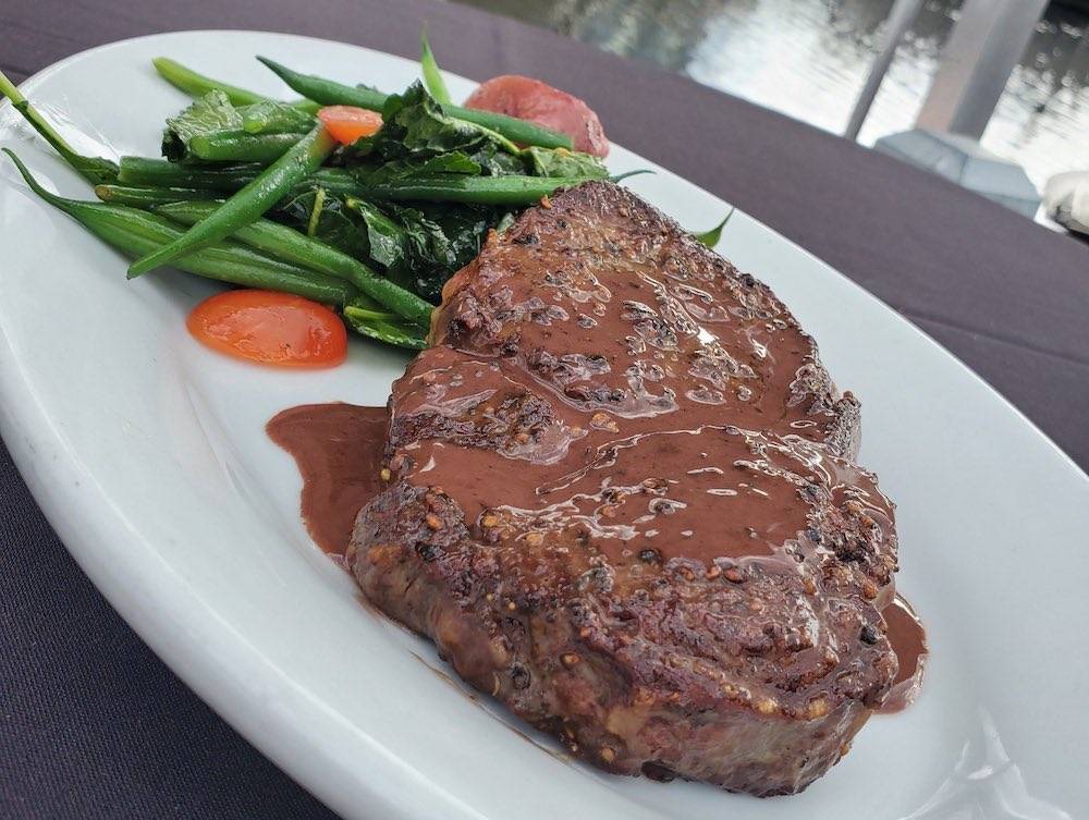 https://allears.net/wp-content/uploads/2021/04/Steak-au-Poivre-Pepper-Steak.jpg