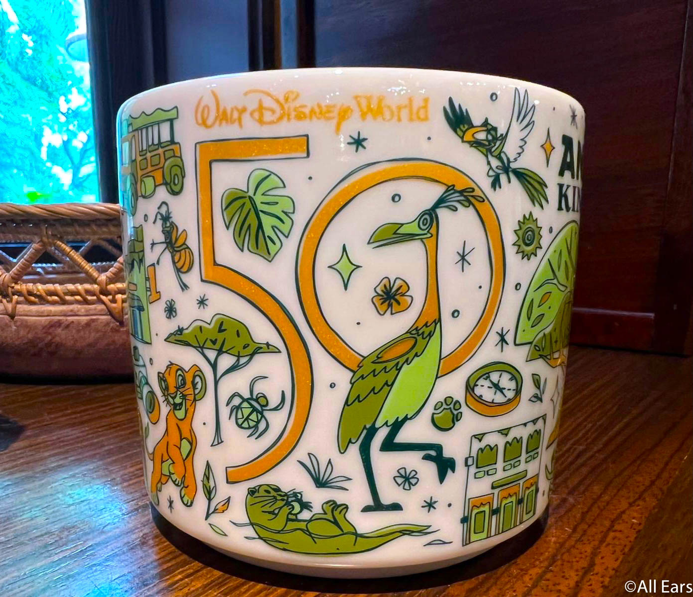 https://allears.net/wp-content/uploads/2021/10/2021-reopening-wdw-animal-kingdom-starbucks-mug-and-ornament-3.jpg