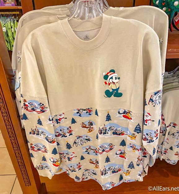 https://allears.net/wp-content/uploads/2021/10/wdw-2021-magic-kingdom-the-emporium-holidays-christmas-merchandise-walt-disney-world-spirit-jersey-mickey-mouse-and-friends-snow-2-577x625.jpg