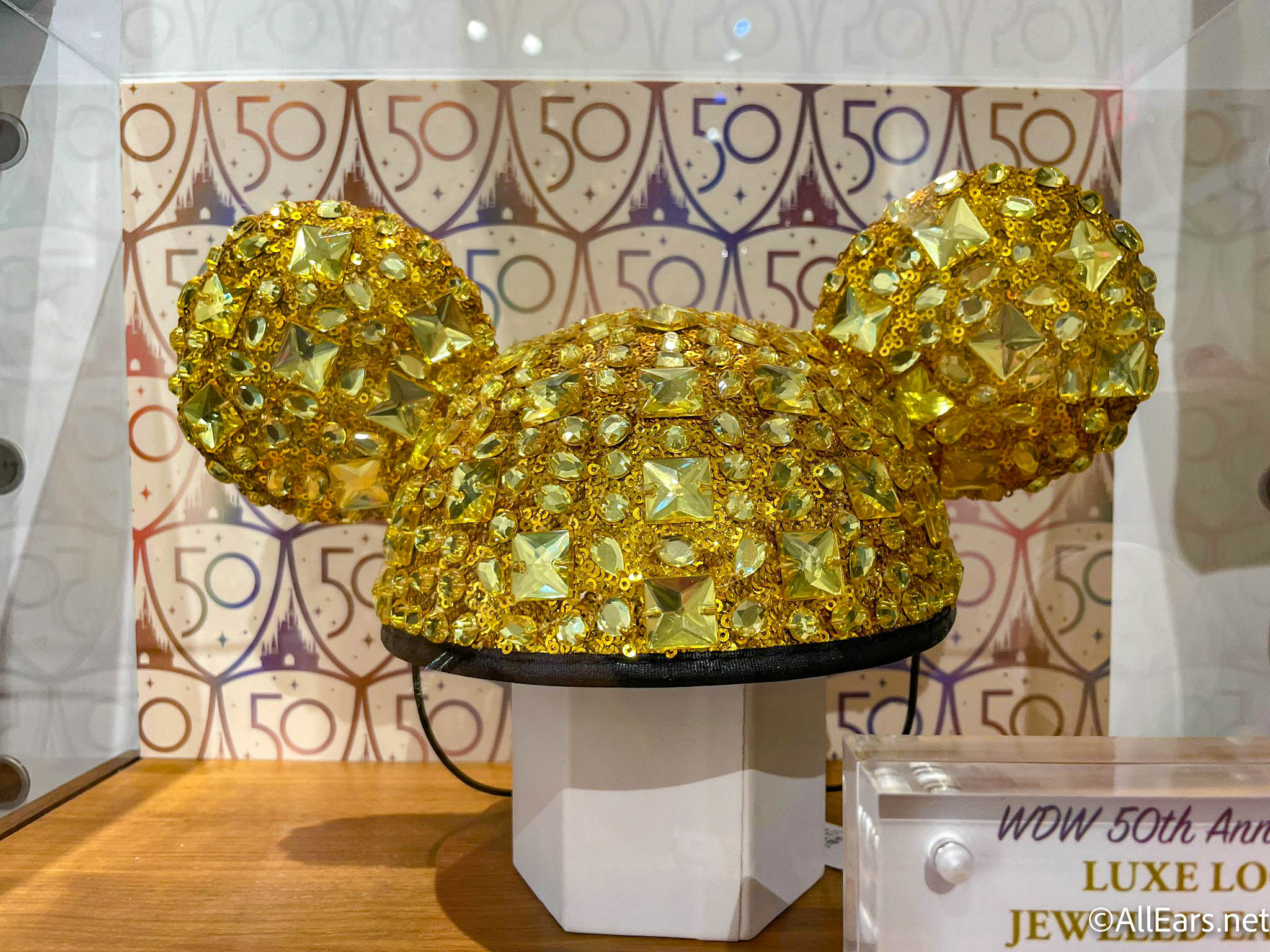 https://allears.net/wp-content/uploads/2021/11/wdw-2021-disney-springs-ever-after-jewelry-company-luxe-logo-collection-mickey-ear-hat-designer-2.jpg