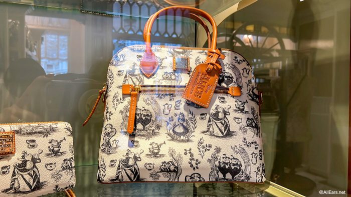 Alice in Wonderland Dooney & Bourke Bags NOW at Uptown Jewelers in Magic  Kingdom 