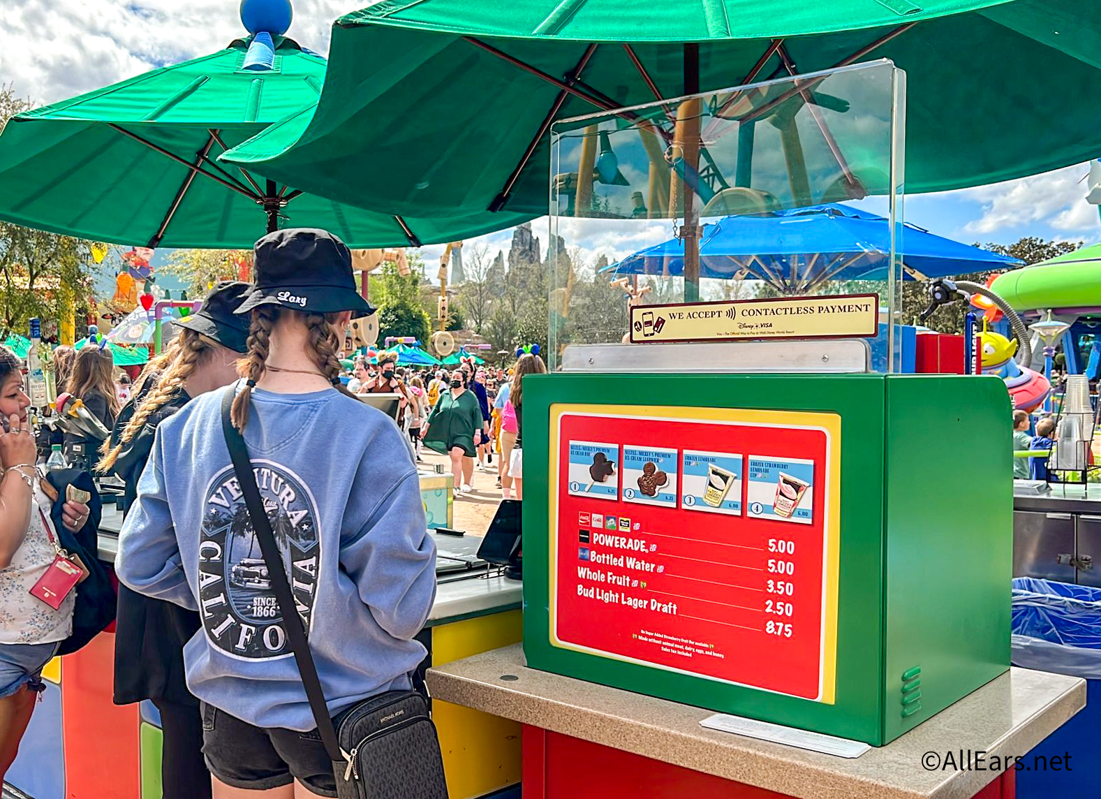2022 wdw disneys hollywood studios toy story land snack stand ice cream  kiosk plexiglass at cash register - AllEars.Net