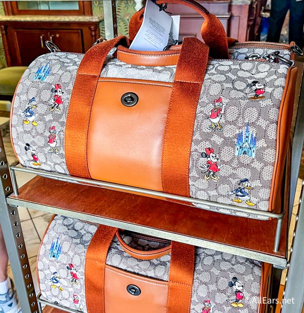 2022 wdw magic kingdom main street usa uptown jewelers Click here to  pre-order the Mickey Mouse and Friends Duffle Bag by COACH 