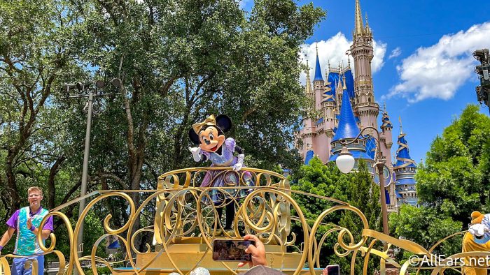 https://allears.net/wp-content/uploads/2022/05/2022-wdw-mk-magic-kingdom-50th-anniversary-cavalcade-minnie-cinderella-castle-700x394.jpg